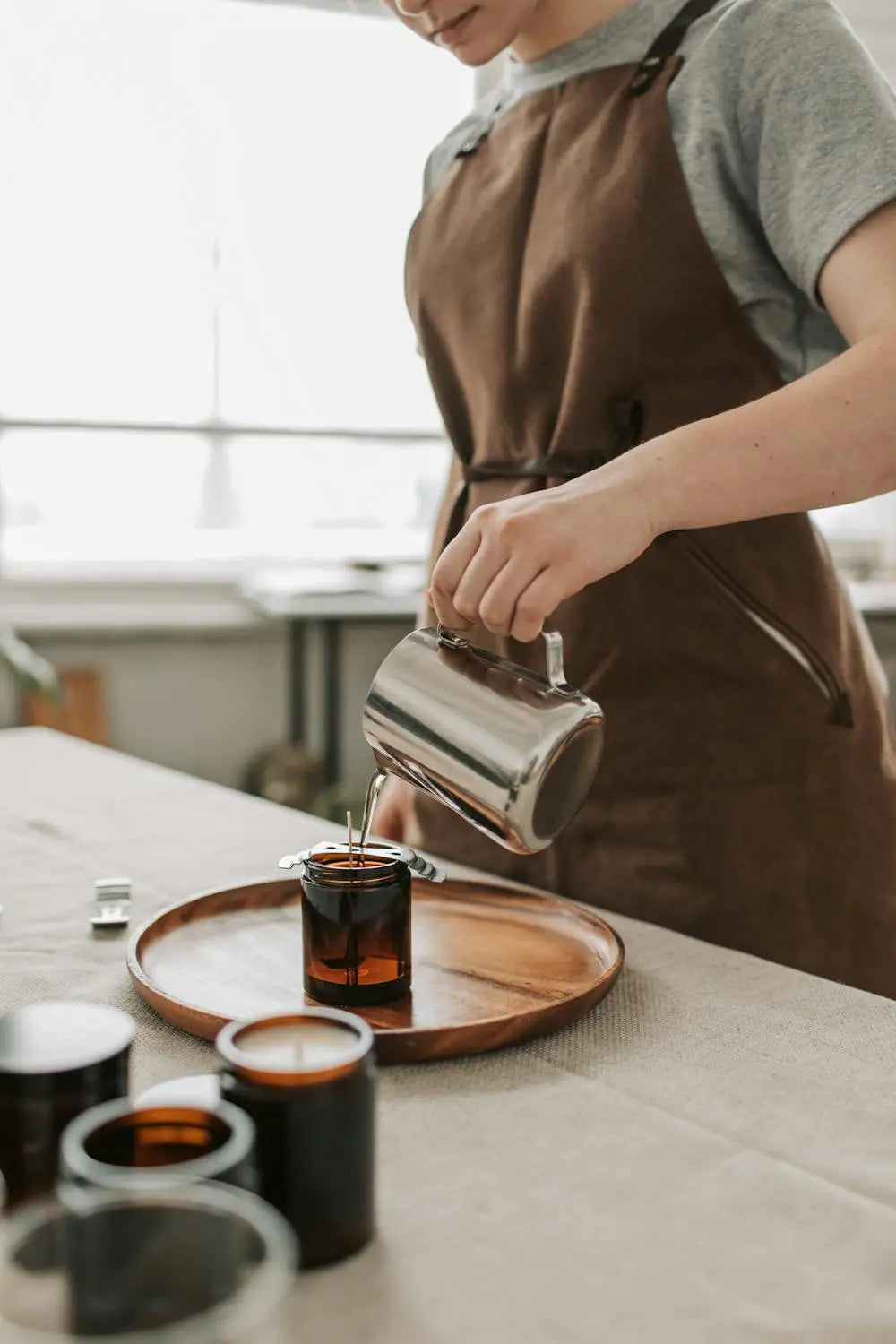 Candle making is more than just a craft—it's an art form that requires skill, precision, and creativity. At Jacy Fragrances, we take pride in the meticulous process that goes into each of our candles. Here’s a glimpse into the art of candle making